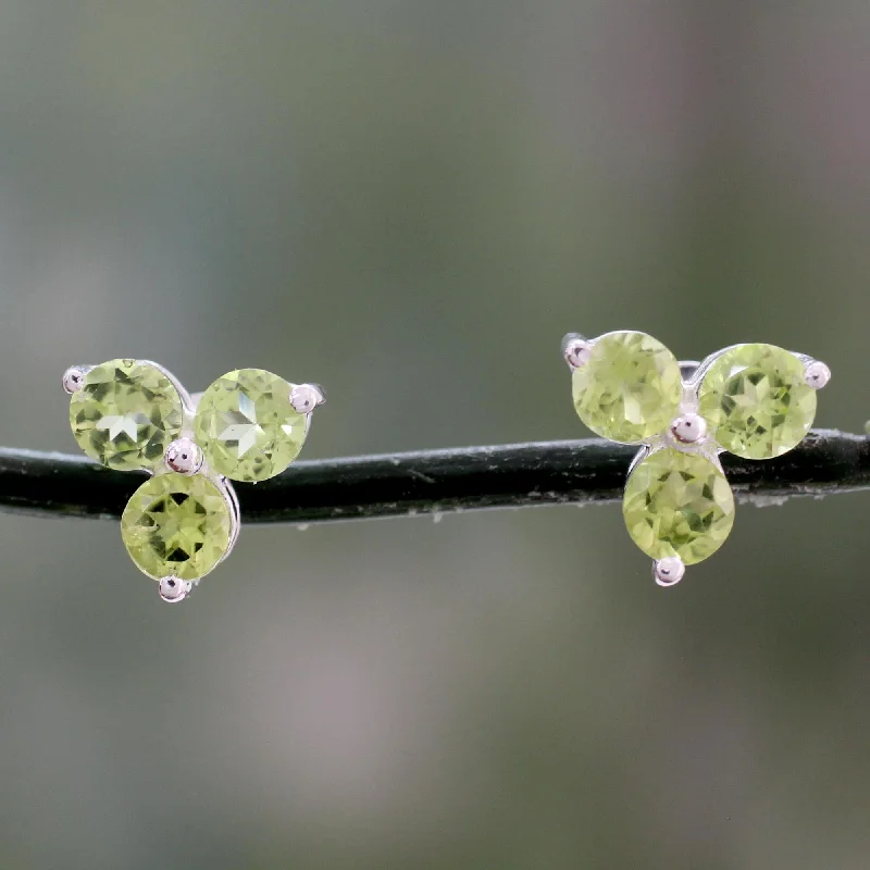 hoop earrings for sensitive ears -Charming Trio Artisan Crafted Triple Peridot Stud Earrings from India